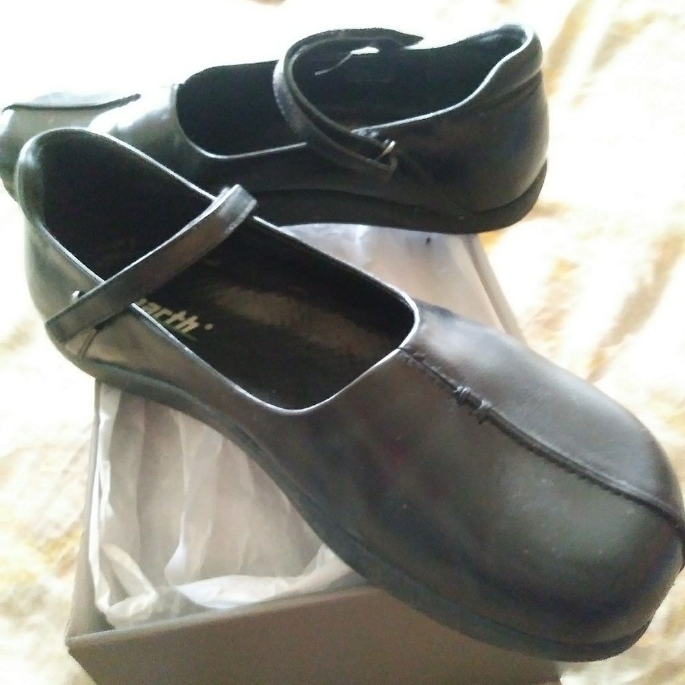 Black leather Mary Janes